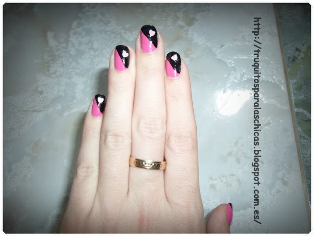 black and pink heart manicure